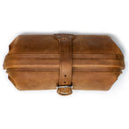 Little Big Mouth Toiletry Bag in Tobacco, top view closed with the leather strap buckled over the frame