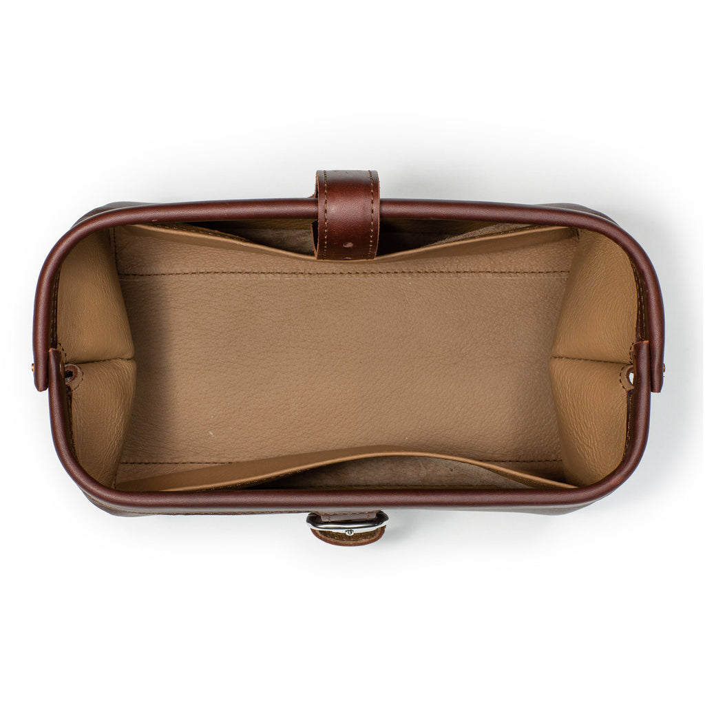 Little Big Mouth Toiletry Bag in Chestnut, top view open and empty showing the wide mouth and lined interior
