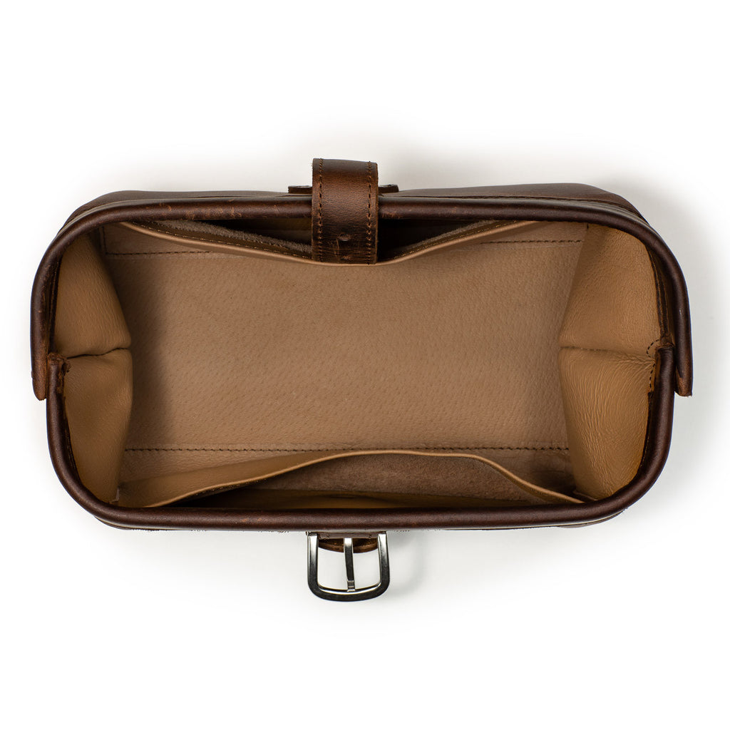 Little Big Mouth Toiletry Bag in Dark Coffee Brown, top view open and empty showing the wide mouth and lined interior