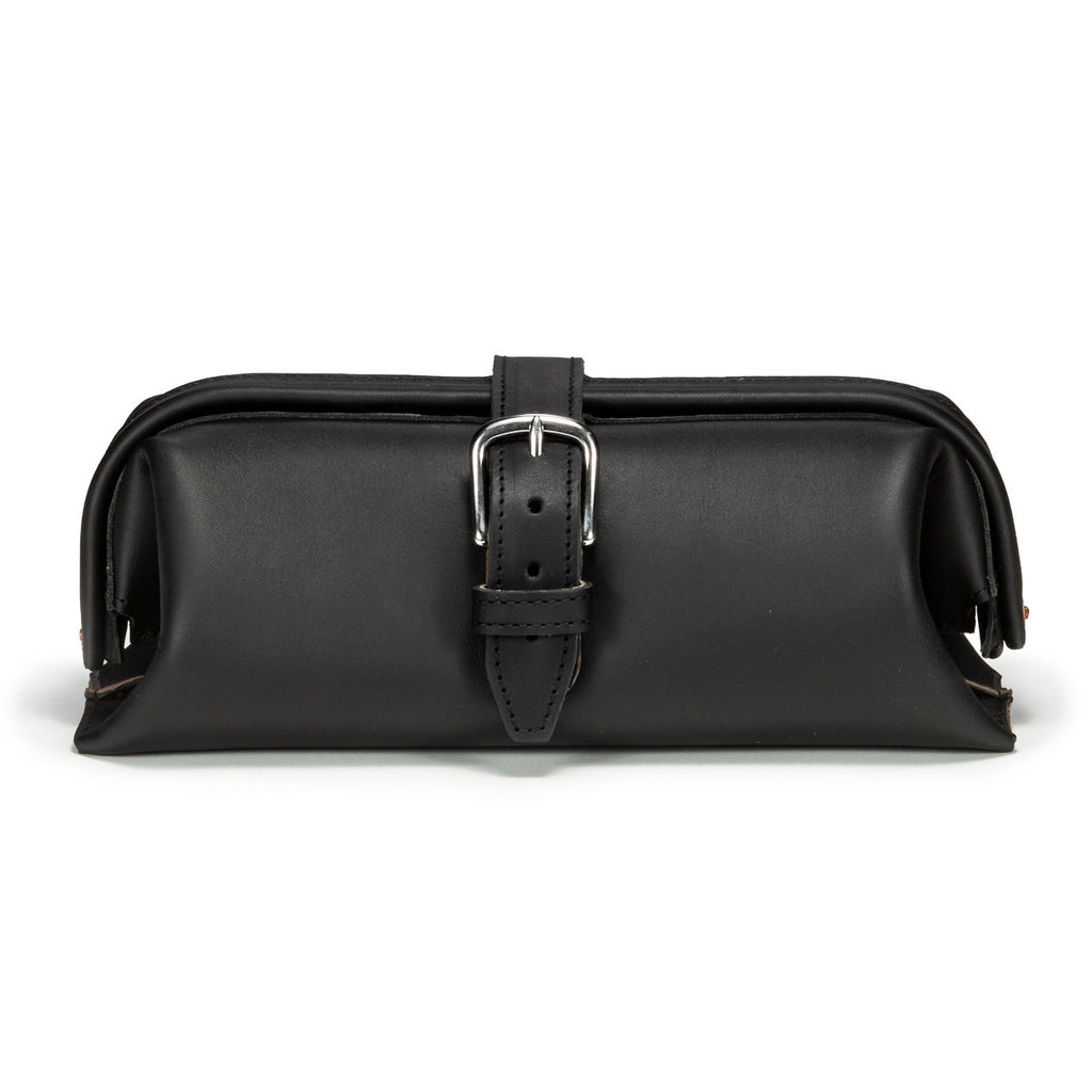 Little Big Mouth Toiletry Bag in Black, front view with wide frame top and buckled strap closure