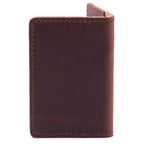 Slim Business Card Holder in Chestnut leather, closed back view showing stitched edges