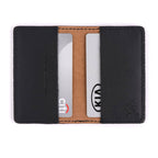 Slim Business Card Holder in Black opened flat with cards in both inner pockets