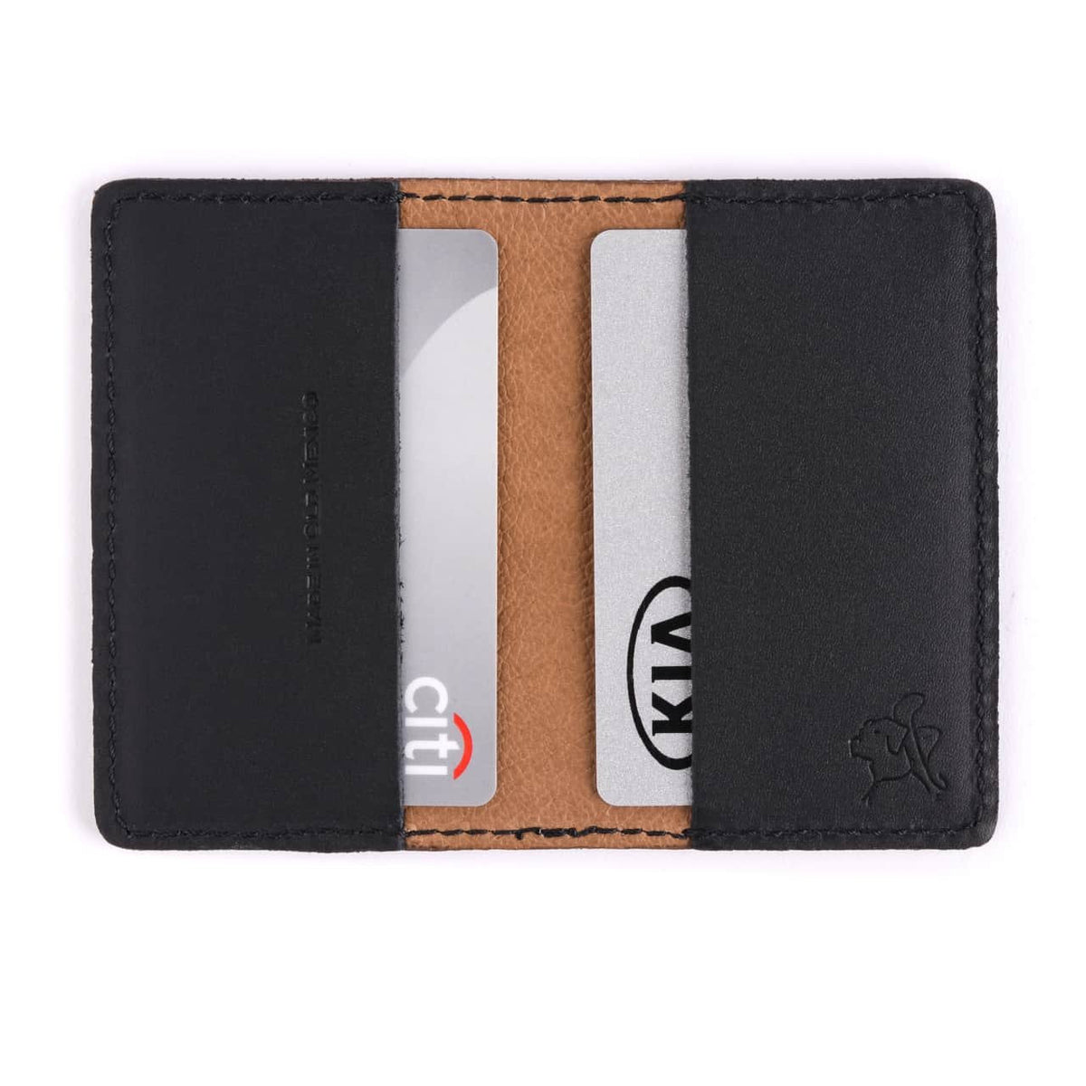 Slim Business Card Holder in Black opened flat with cards in both inner pockets