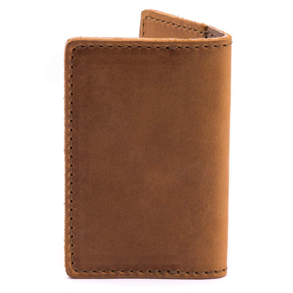 Slim Business Card Holder in Tobacco leather, closed back view showing stitched edges