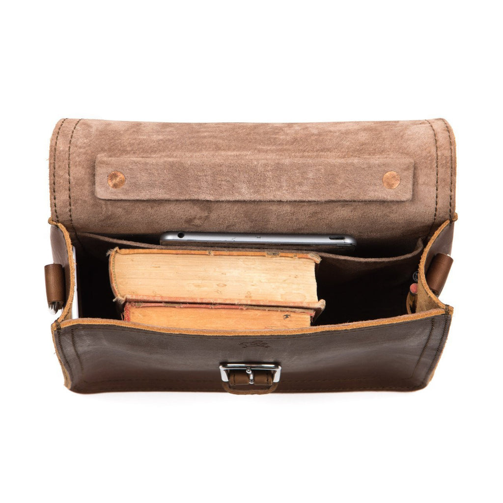Indiana Leather Satchel in Tobacco, top view open showing old books and a tablet inside