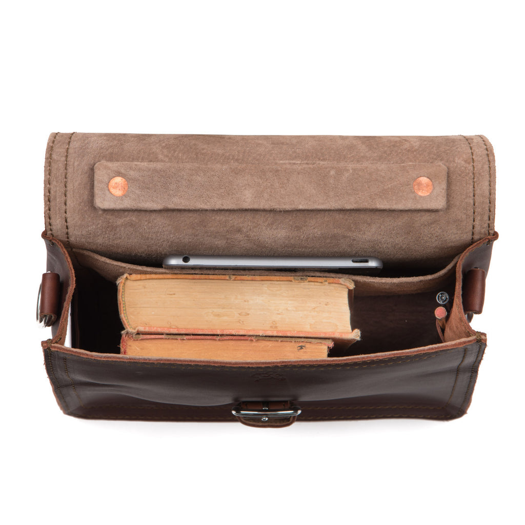 Indiana Leather Satchel in Chestnut, top view open showing old books and a phone inside