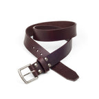Old Bull Leather Belt in Chestnut with riveted stainless steel buckle, coiled to show the thick strap