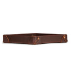 The Leather Grandfather Valet Tray in Chestnut, low side view showing stitched corner tabs with rivets