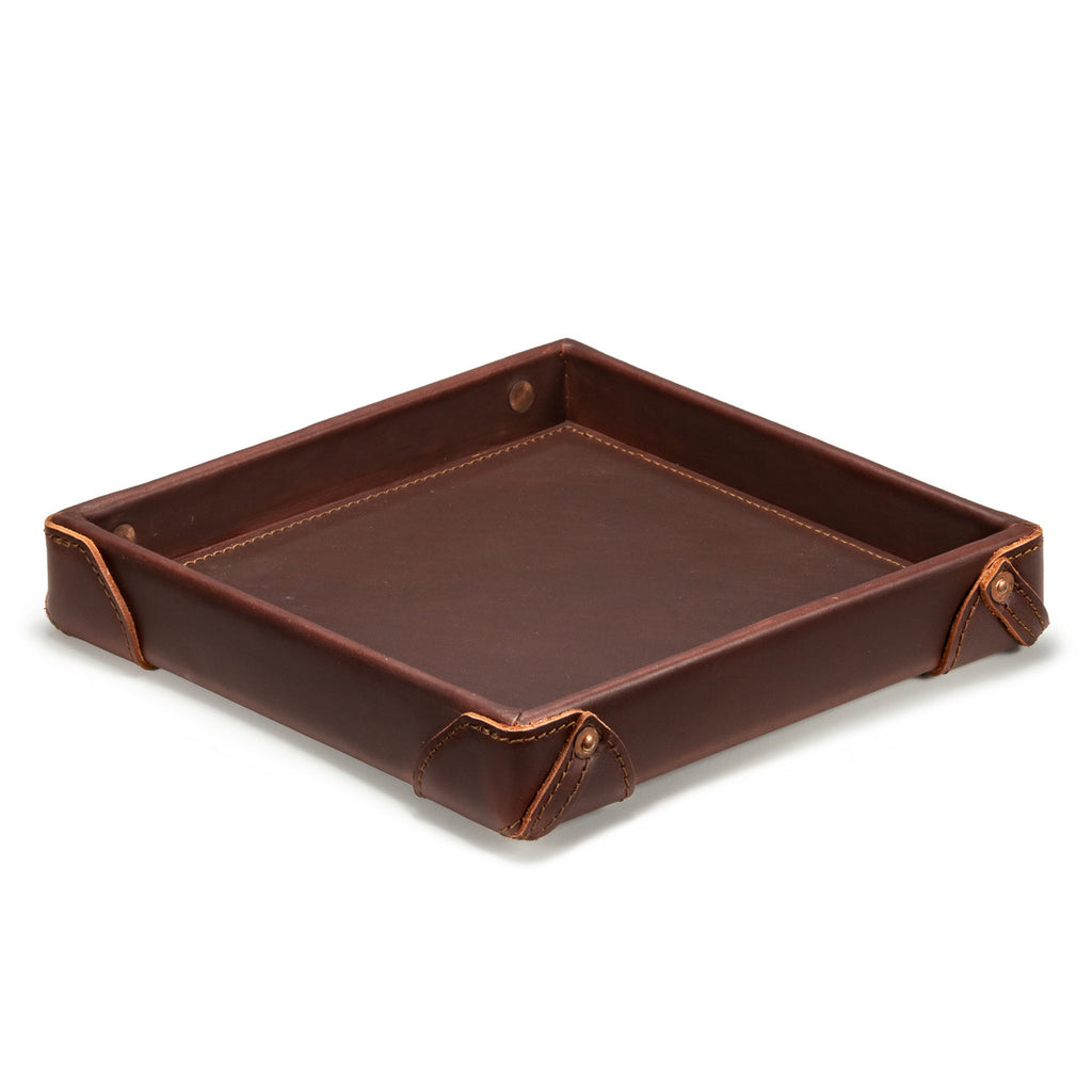 The Leather Grandfather Valet Tray in Chestnut, empty, angled view showing interior and riveted corner tabs