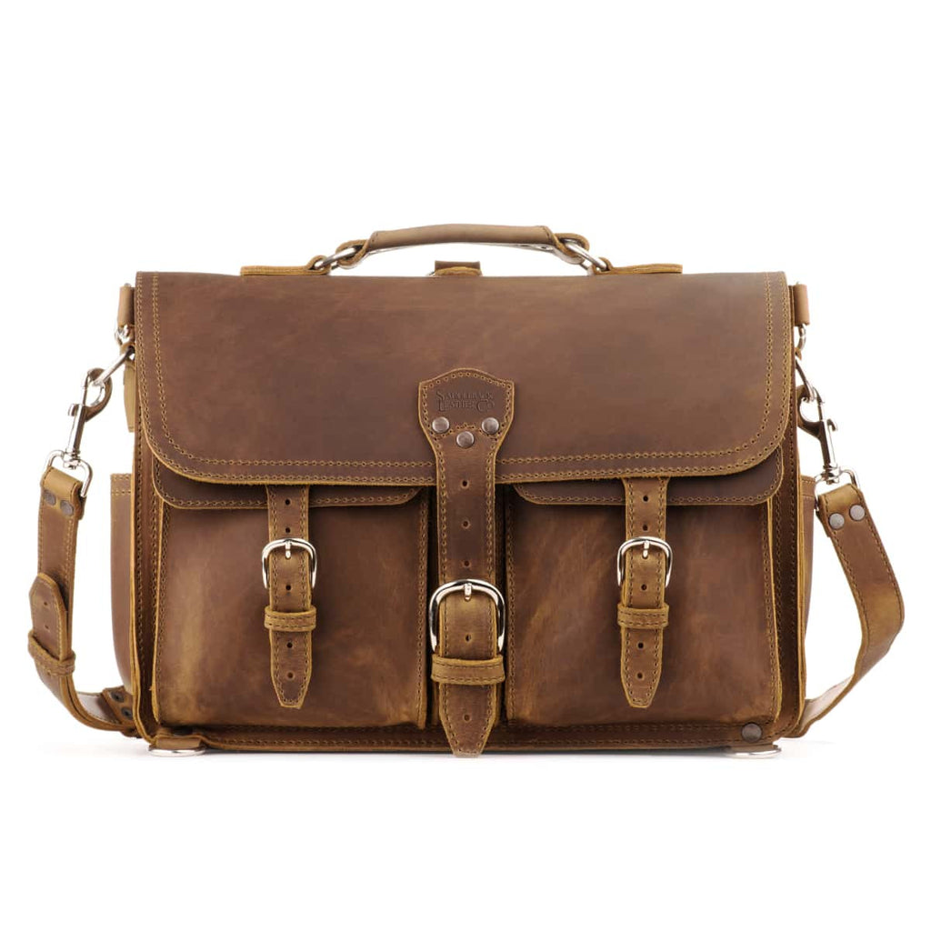 Front Pocket Leather Briefcase in Tobacco, front view with two buckled front pockets, top handle and shoulder strap