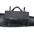 Shotgun Sleeve in Black, close-up of the front accessory pocket with flap open and buckle straps