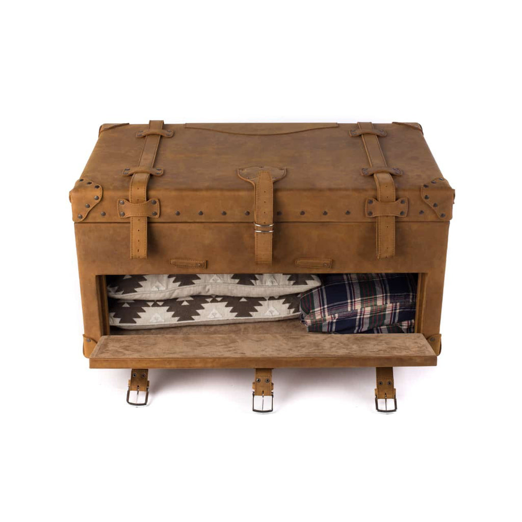 Leather Trunk in Tobacco with drop-front drawer open to show folded blankets and a flannel shirt