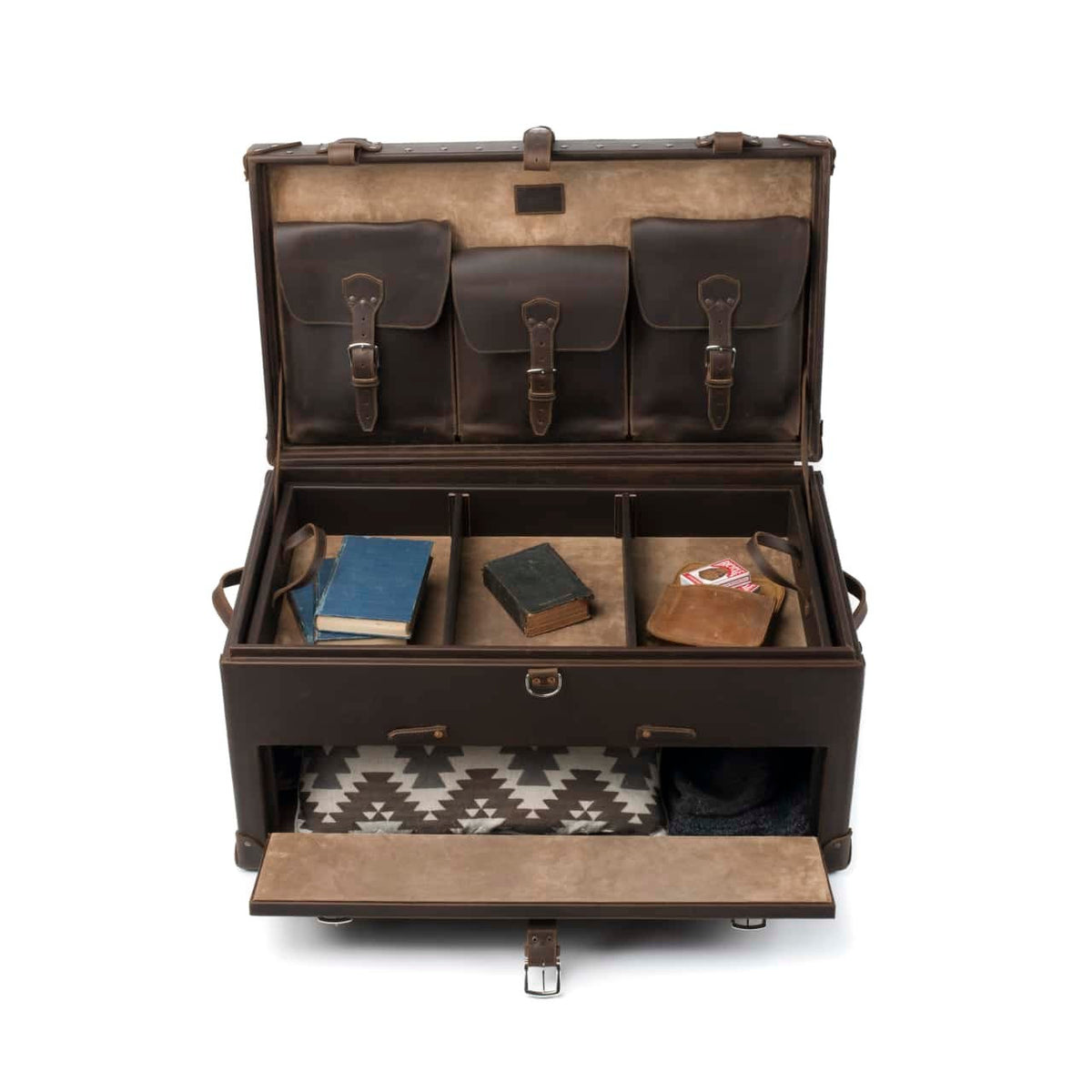 Leather Trunk in Dark Coffee Brown, open with books in the top tray and a folded blanket in the front drawer