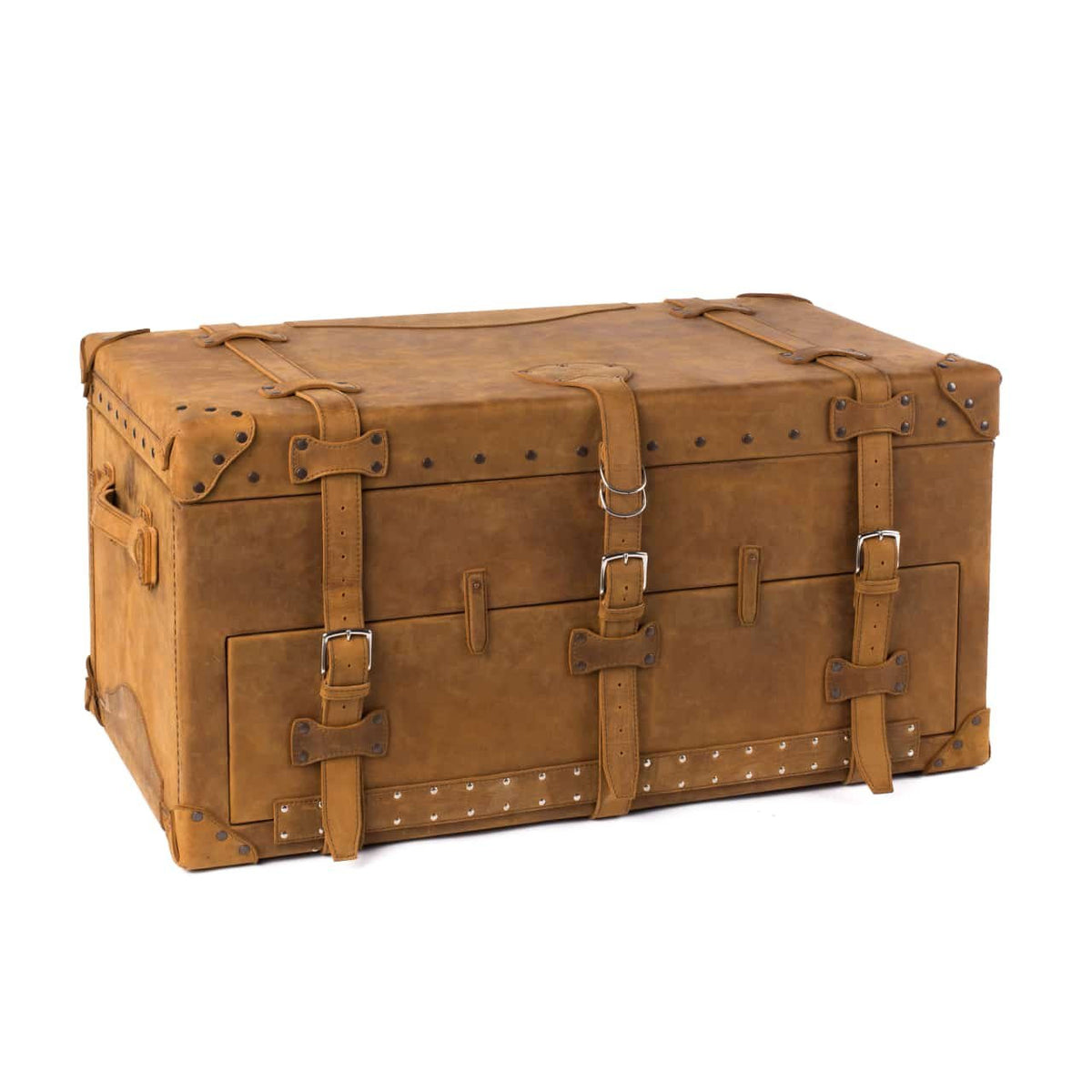 Leather Trunk in Tobacco, closed angled view with buckled straps, side handle and studded trim