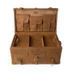 Leather Trunk in Tobacco, open with three buckled lid pockets above a divided top tray and strapped front