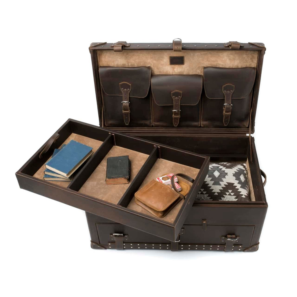 Leather Trunk in Dark Coffee Brown, open with tray lifted out holding books and a leather pouch