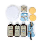Leather Restoration Kit Chamberlain's Leather Milk, contents laid flat with bottles, pads, sponges and brush