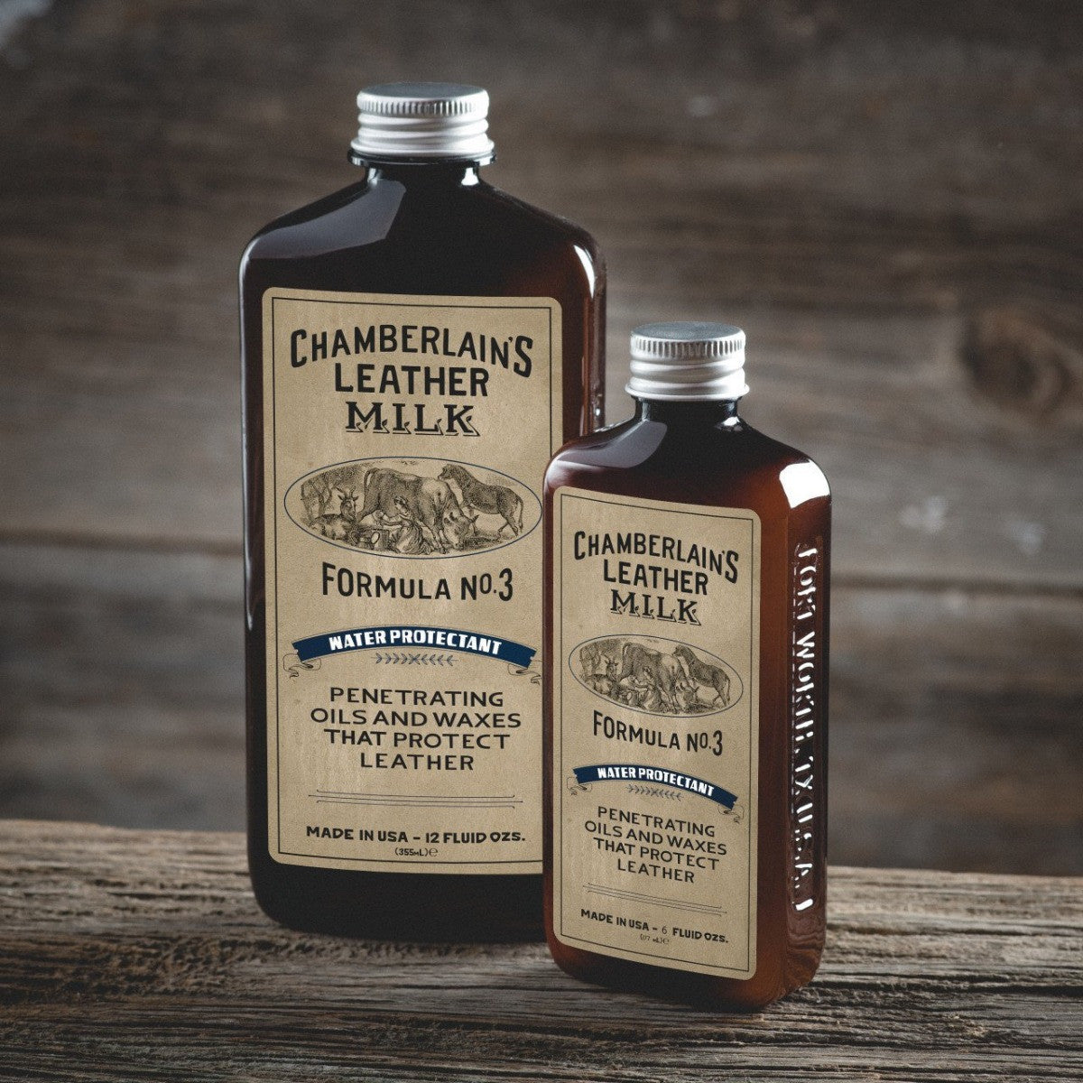 Chamberlain's Water Protectant No. 3 leather protector in large and small bottles on a wooden surface