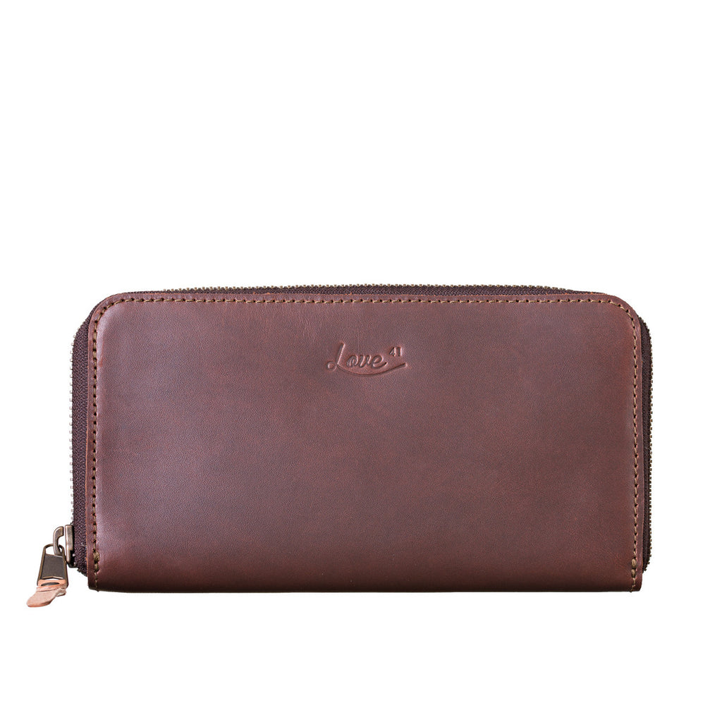 Continental Leather Wallet in Chestnut, front view showing zipper pull and embossed logo