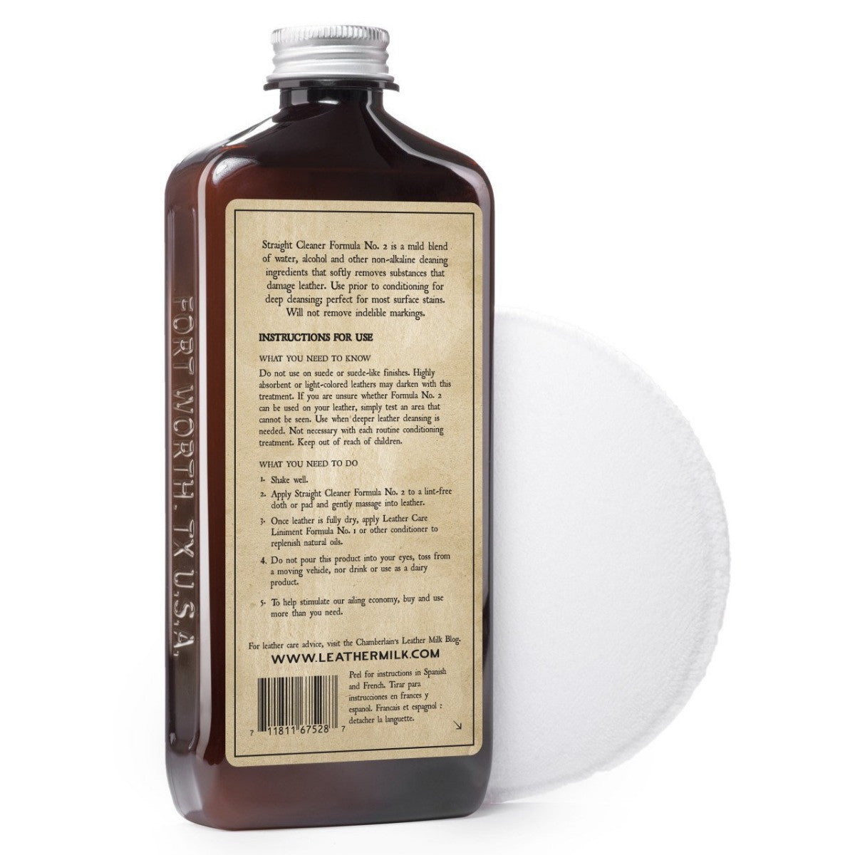 Chamberlain's No. 2 leather cleaner, angled back label view with an applicator pad behind the bottle