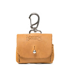 Leather AirPods Pro Case in Tobacco, front view with embossed Saddleback logo, stud closure and carabiner clip
