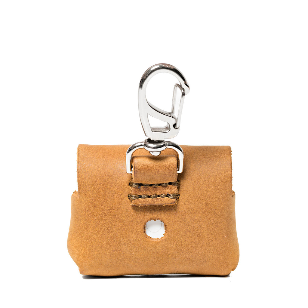 Leather AirPods Pro Case in Tobacco, back view with carabiner clip and stitched loop