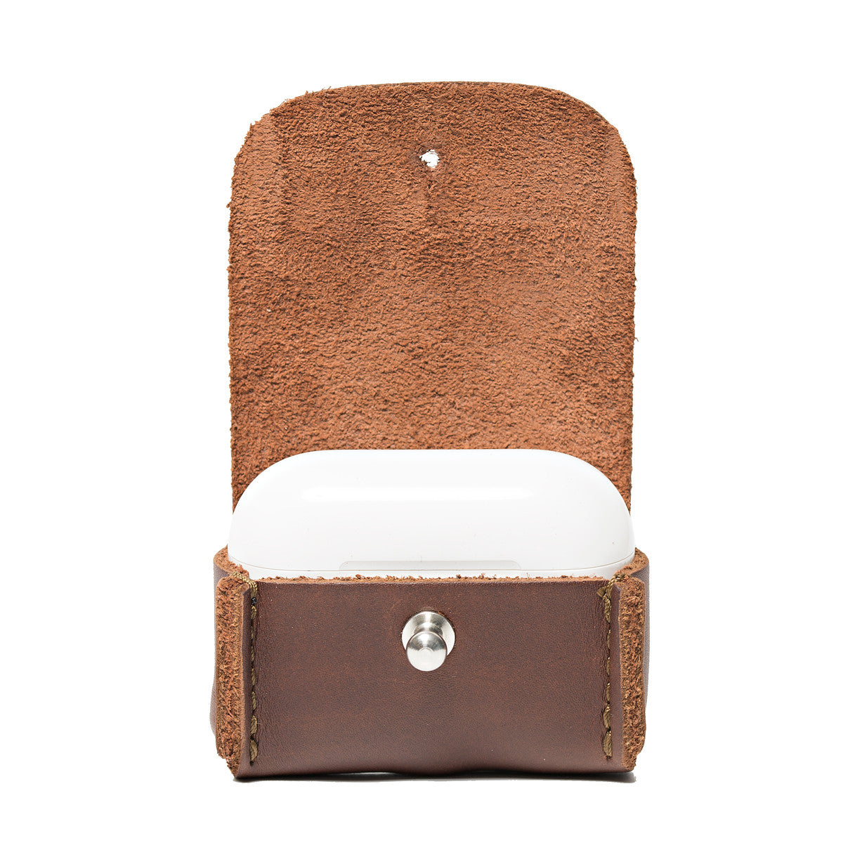 Leather AirPods Pro Case in Chestnut, flap open showing the suede lining and closed charging case inside