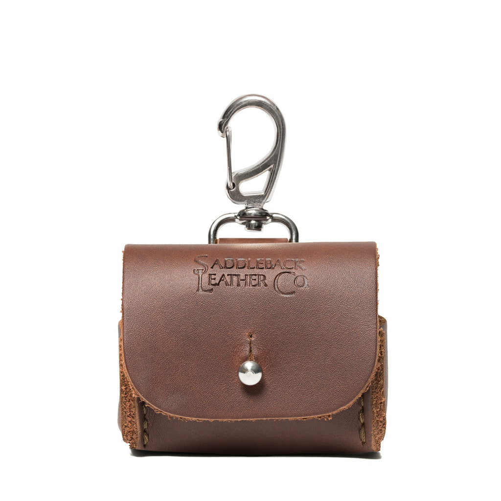 Leather AirPods Pro Case in Chestnut, front view with embossed Saddleback logo, stud closure and carabiner clip