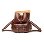 Front Pocket Leather Backpack in Chestnut, front view with flap folded back showing the suede underside