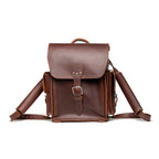 Tank Backpack in Chestnut, front view with buckled flap and side pockets