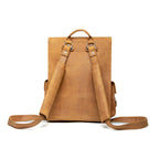 Thin Front Pocket Leather Backpack in Tobacco, back view with padded shoulder straps and top handle
