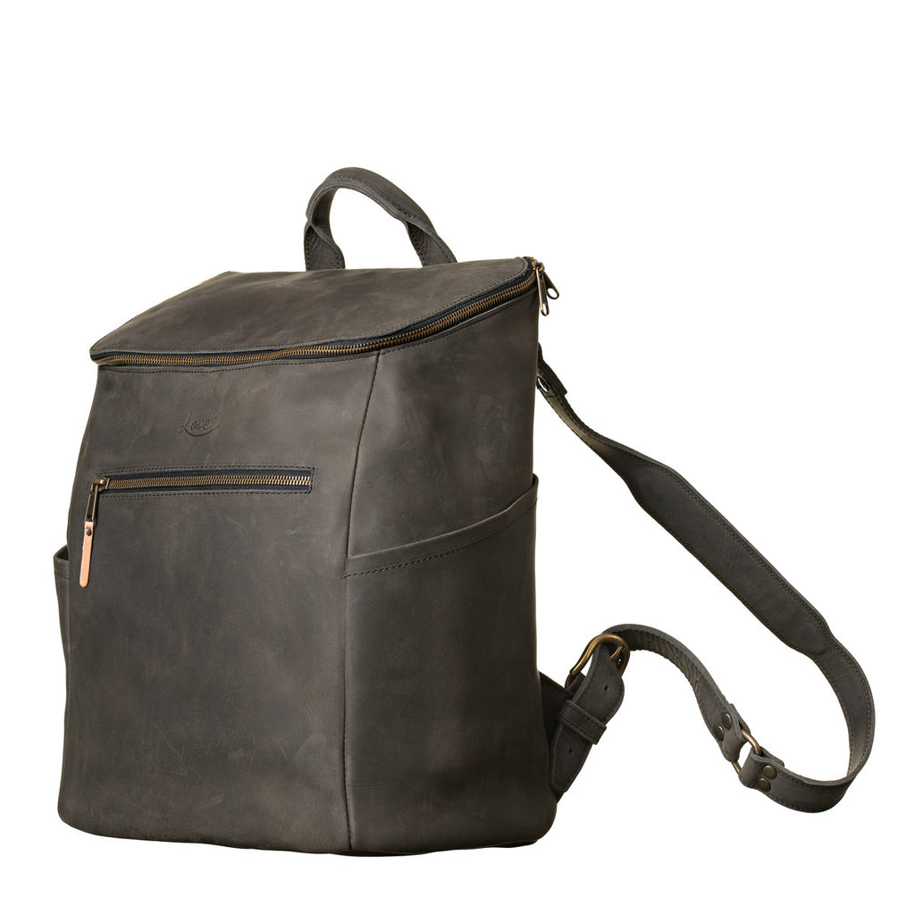 All in One Leather Backpack in Black, angled front view with side pocket and shoulder strap