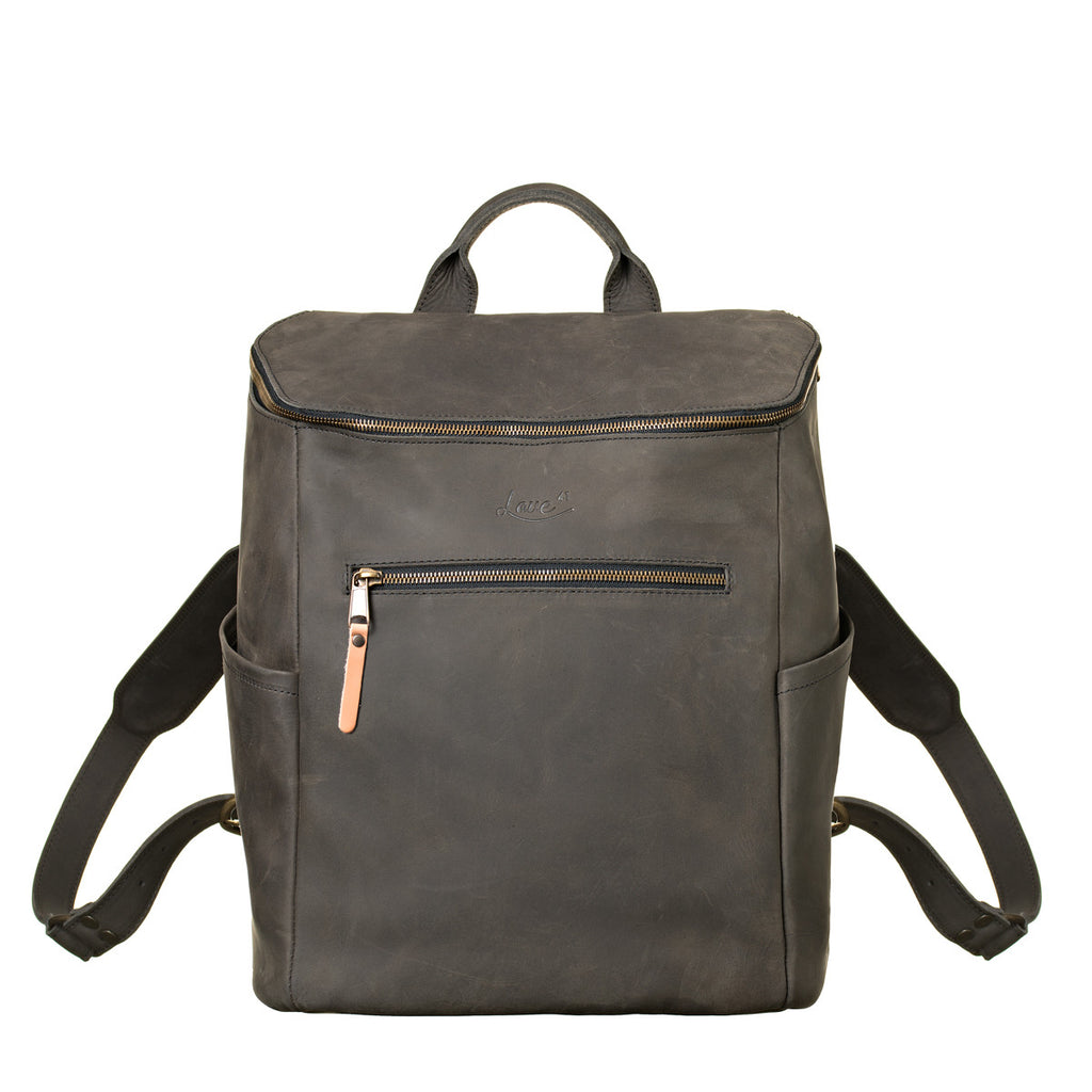 All in One Leather Backpack in Black, front view showing zippered pocket, side pockets and straps