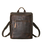 All in One Leather Backpack in Dark Coffee Brown, front view showing zippered pocket, side pockets and straps