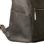 All in One Leather Backpack in Black, close-up of side pocket, zipper pull and strap buckle