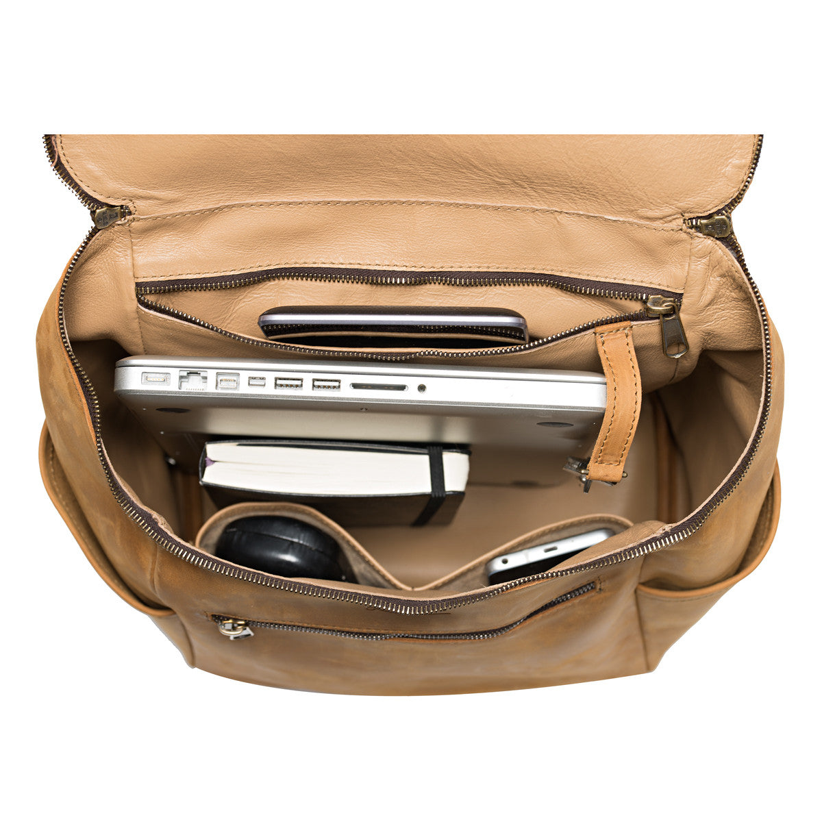 All in One Leather Backpack in Tobacco, open top view with laptop, notebook, headphones and phone inside
