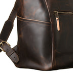 All in One Leather Backpack in Dark Coffee Brown, close-up of side pocket, zipper pull and strap buckle