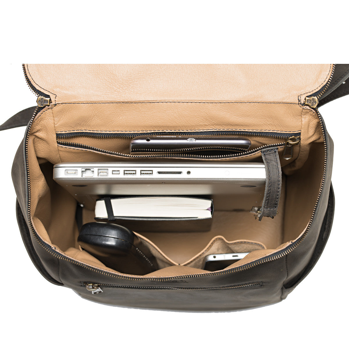 All in One Leather Backpack in Black, open top view with laptop, notebook, headphones and phone inside