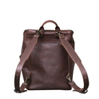 All in One Leather Backpack in Chestnut, back view showing adjustable shoulder straps and back slip pocket