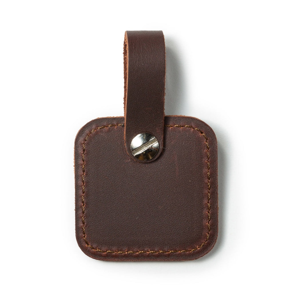 Leather Bag Tag in Chestnut, back view with stitched edges and screw post on the strap