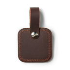 Leather Bag Tag in Chestnut, back view with stitched edges and screw post on the strap