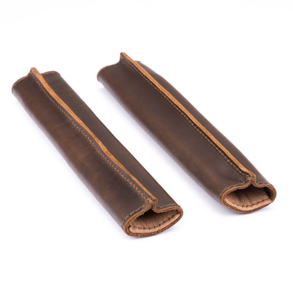 Backpack Tube Pads in Dark Coffee Brown, pair of leather shoulder strap pads