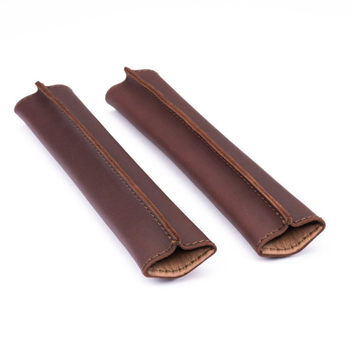 Backpack Tube Pads in Chestnut, pair of leather shoulder strap pads