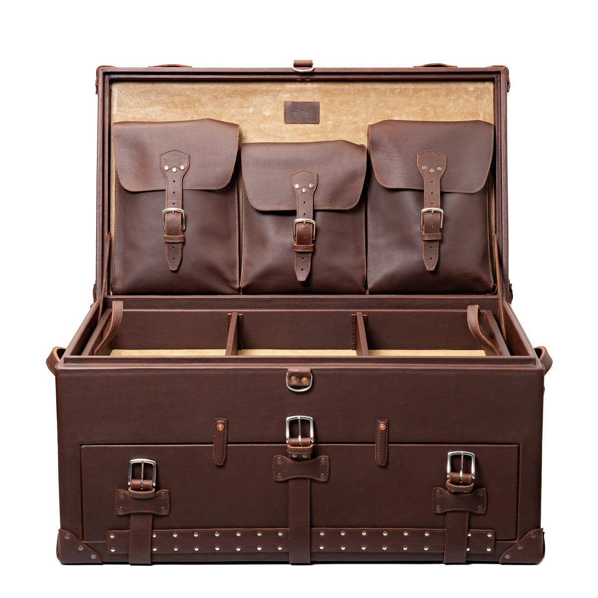 Leather Trunk in Chestnut, open lid with three buckled pockets above a divided top tray and strapped front