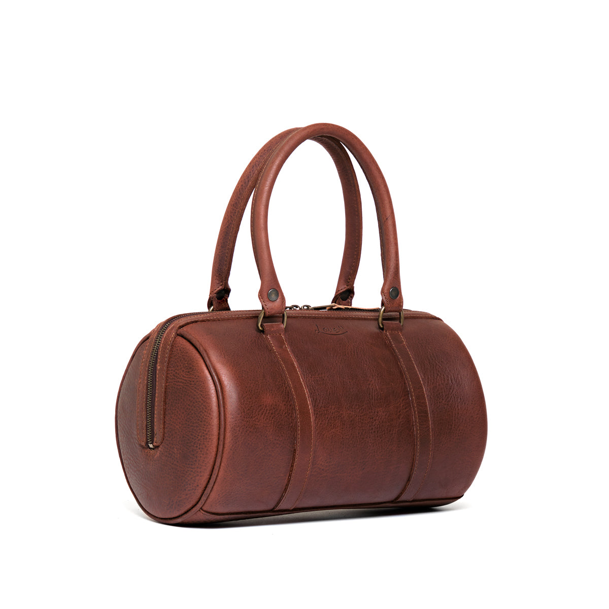 Everyday Barrel Bag in Chestnut, angled view showing the round end with zippered pocket