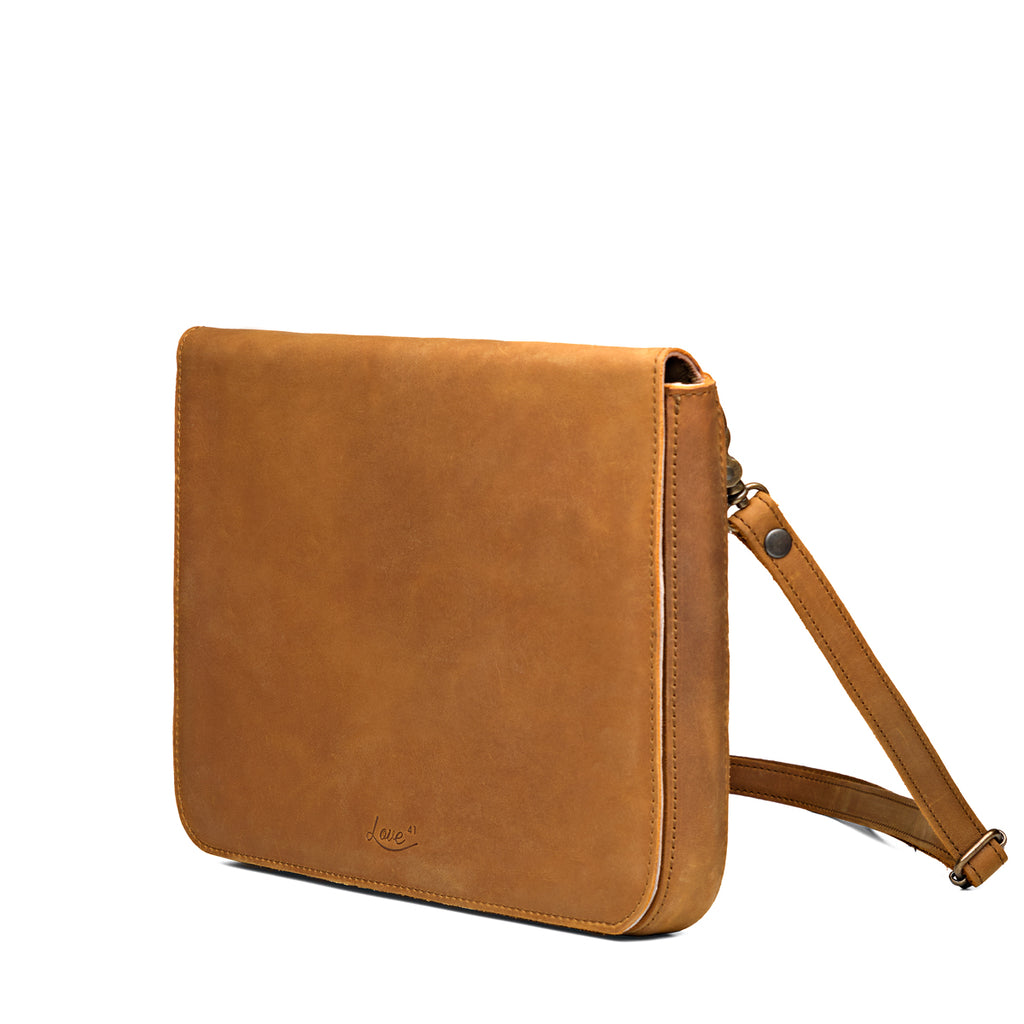 Magnetic Fold Over Bag Large in Tobacco, angled front view with fold-over flap and shoulder strap