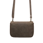 Magnetic Fold Over Bag Medium in Black, front view with flap closed and shoulder strap