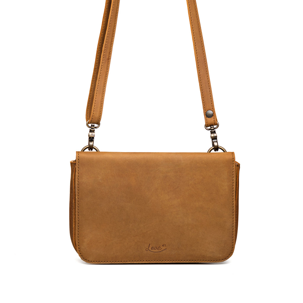 Magnetic Fold Over Bag Medium in Tobacco, front view with flap closed and shoulder strap