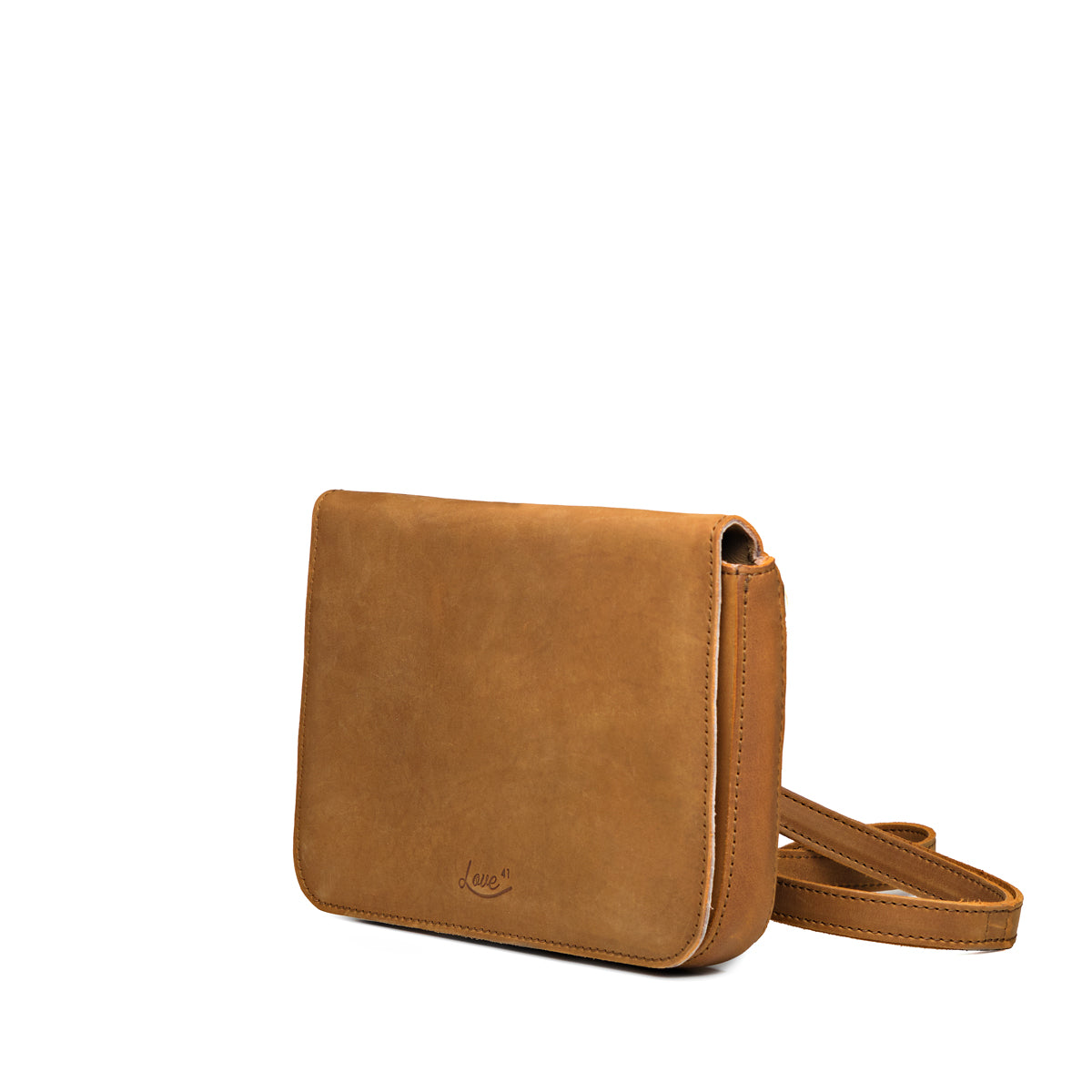 Magnetic Fold Over Bag Medium in Tobacco, angled side view with strap resting beside the bag