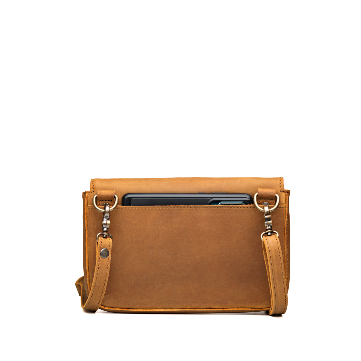 Magnetic Fold Over Bag Medium in Tobacco, back view with a phone in the rear slip pocket
